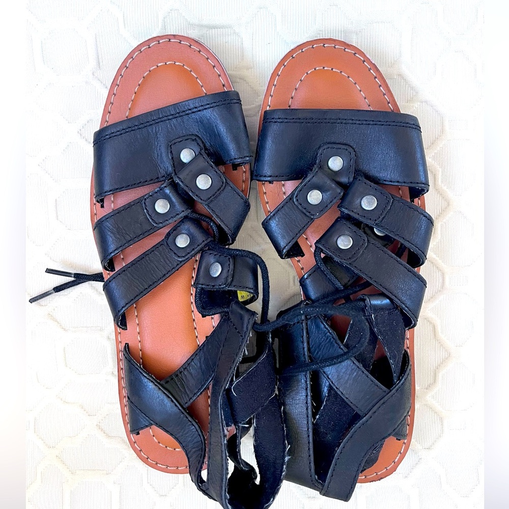 CAT brand black gladiator sandal. Rugged sole.